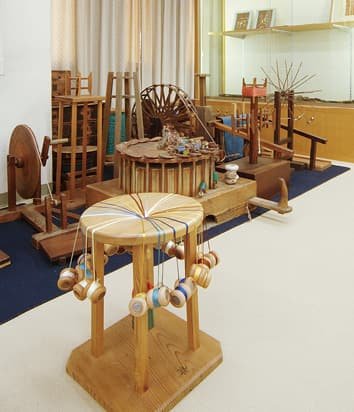 A kumihimo braiding stand and production tools