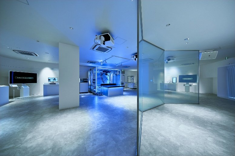 A gallery illuminated in blue light