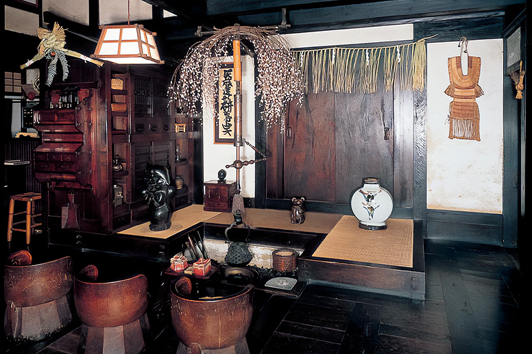 The interior featuring an irori sunken hearth