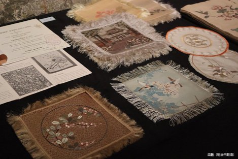 A display table lined with textile samples