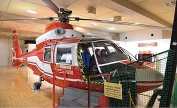 A helicopter displayed inside the building