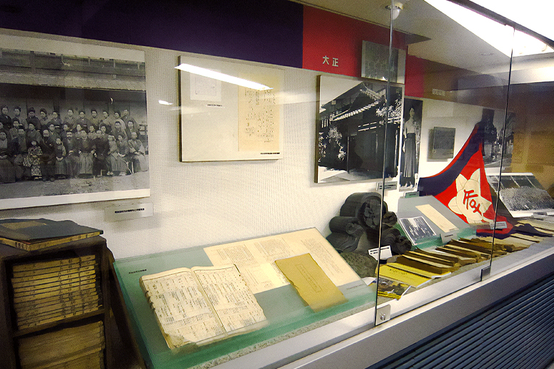 A display case containing school-related materials