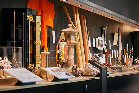 A display table lined with crafts and other items