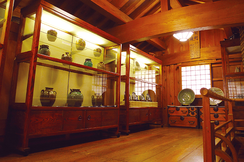 A wooden exhibition room displaying folk crafts