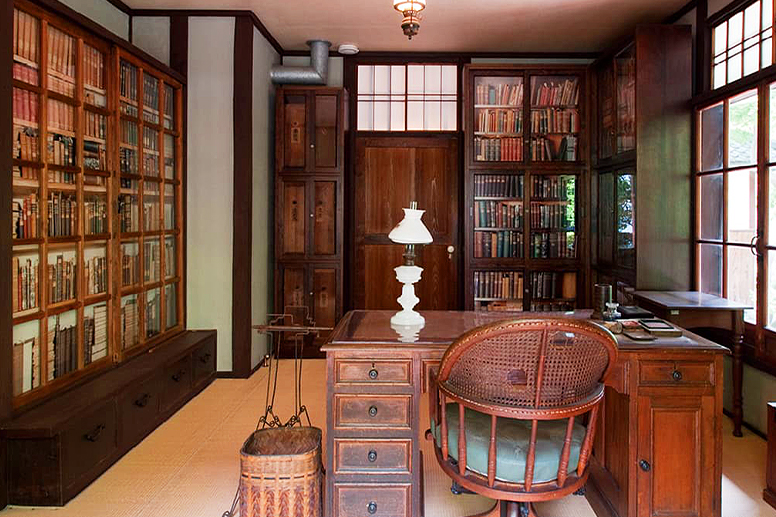 A study with bookshelves and a desk