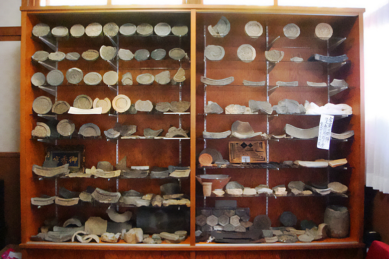 A display shelf lined with artifacts