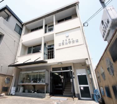 The exterior of a three-story building