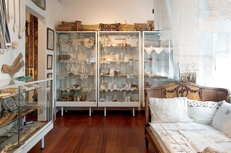 An exhibition room displaying lace works