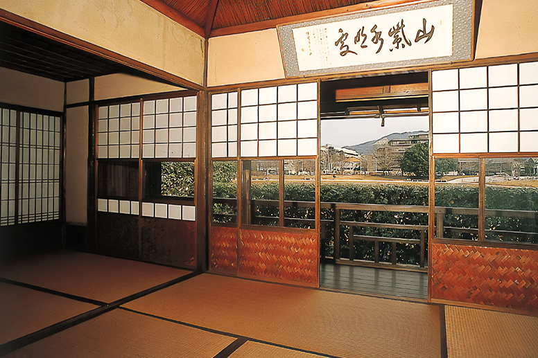 A tatami room with calligraphy on display