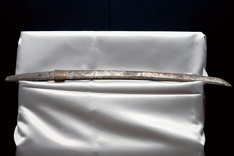 Swords placed on a white cloth